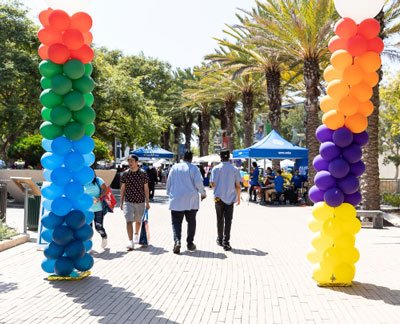 campus event with colorful balloon columns