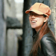young woman in baseball cap