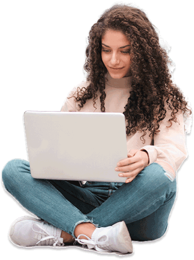 young woman sitting holding laptop