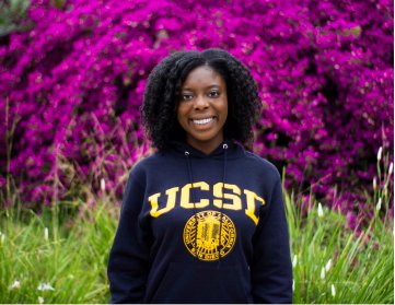 Young woman wearing a University of California San Diego sweatshirt