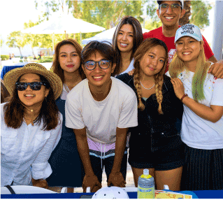 a group of smiling students pose for a photo